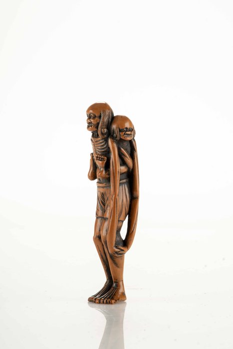 En stor, usædvanlig buksbom netsuke, der forestiller Ashinaga, der bærer Tenaga - Japan - Edo-perioden (1600-1868)