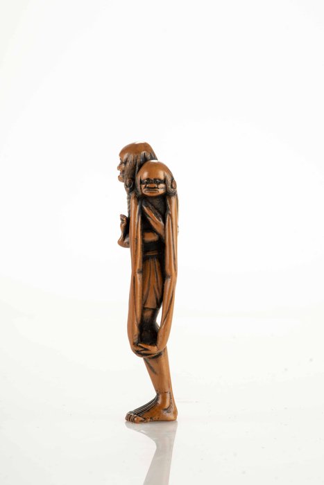 En stor, usædvanlig buksbom netsuke, der forestiller Ashinaga, der bærer Tenaga - Japan - Edo-perioden (1600-1868)