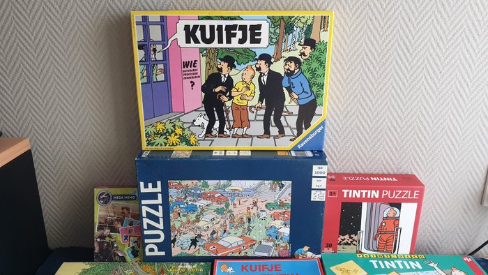 Tintin - 12 Various merchandise objects - Moulinsart, Nathan, Ravensburger, Hemma, Wildhorse, Dusserre, Cartamundi. - 1981