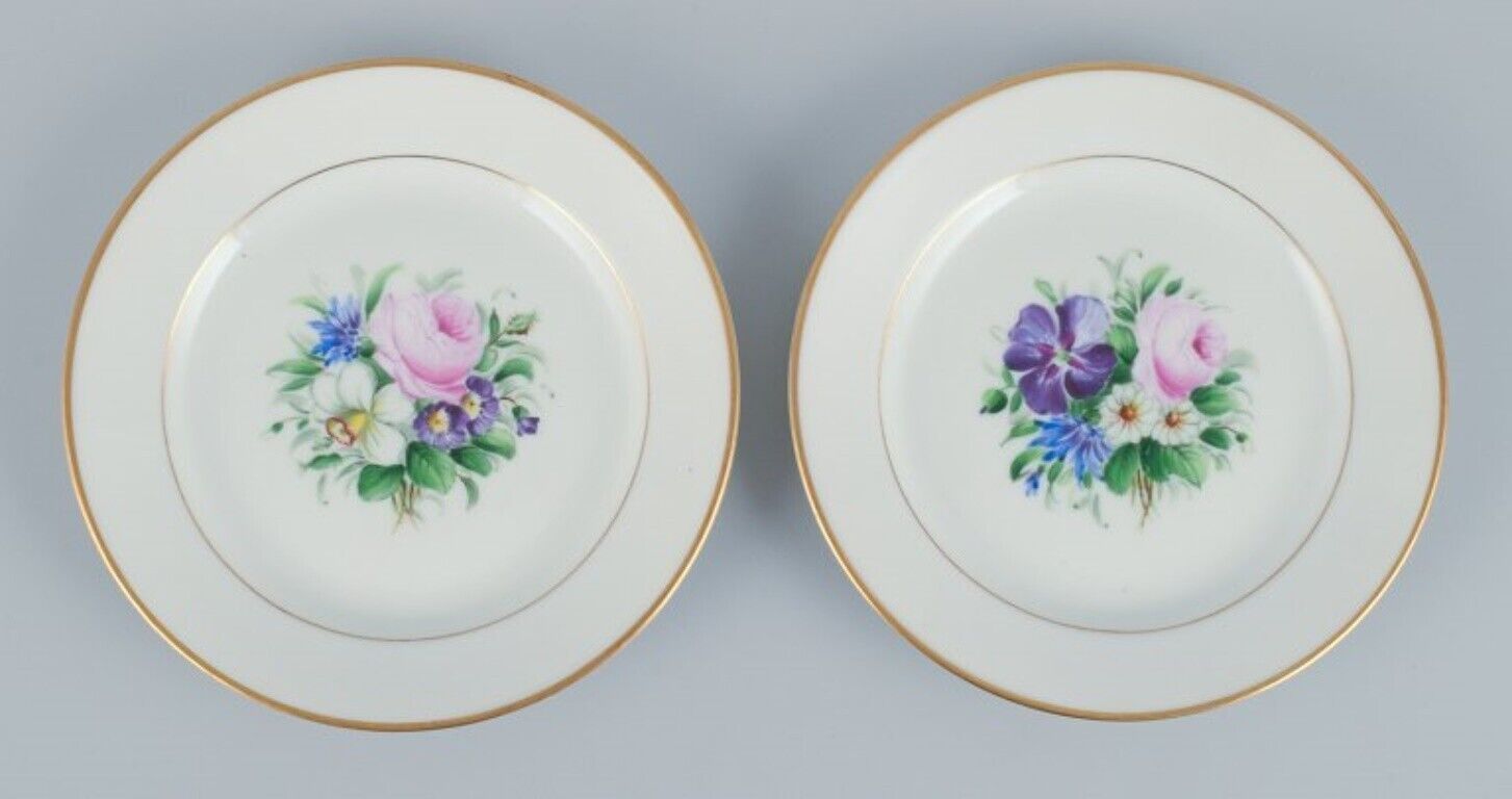 Bing  Grondahl set of fourteen plates in porcelain with flowers