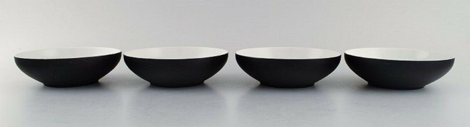 Kenji Fujita for Tackett Associates Four bowls in porcelain Dated 1953-56