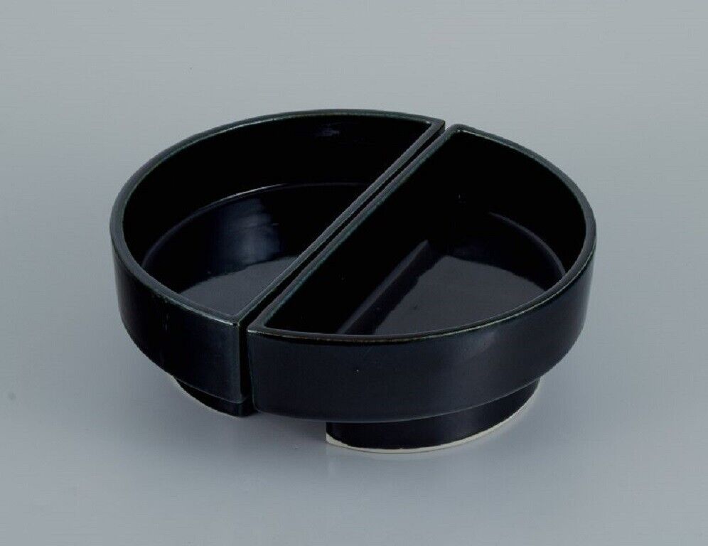 European studio potter Two-piece unique bowl in black glaze Late 1900s