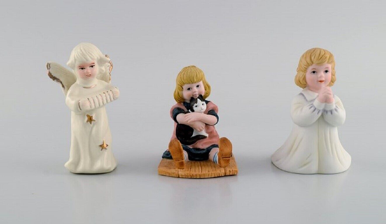 Five porcelain figurines Angels and children 1980s