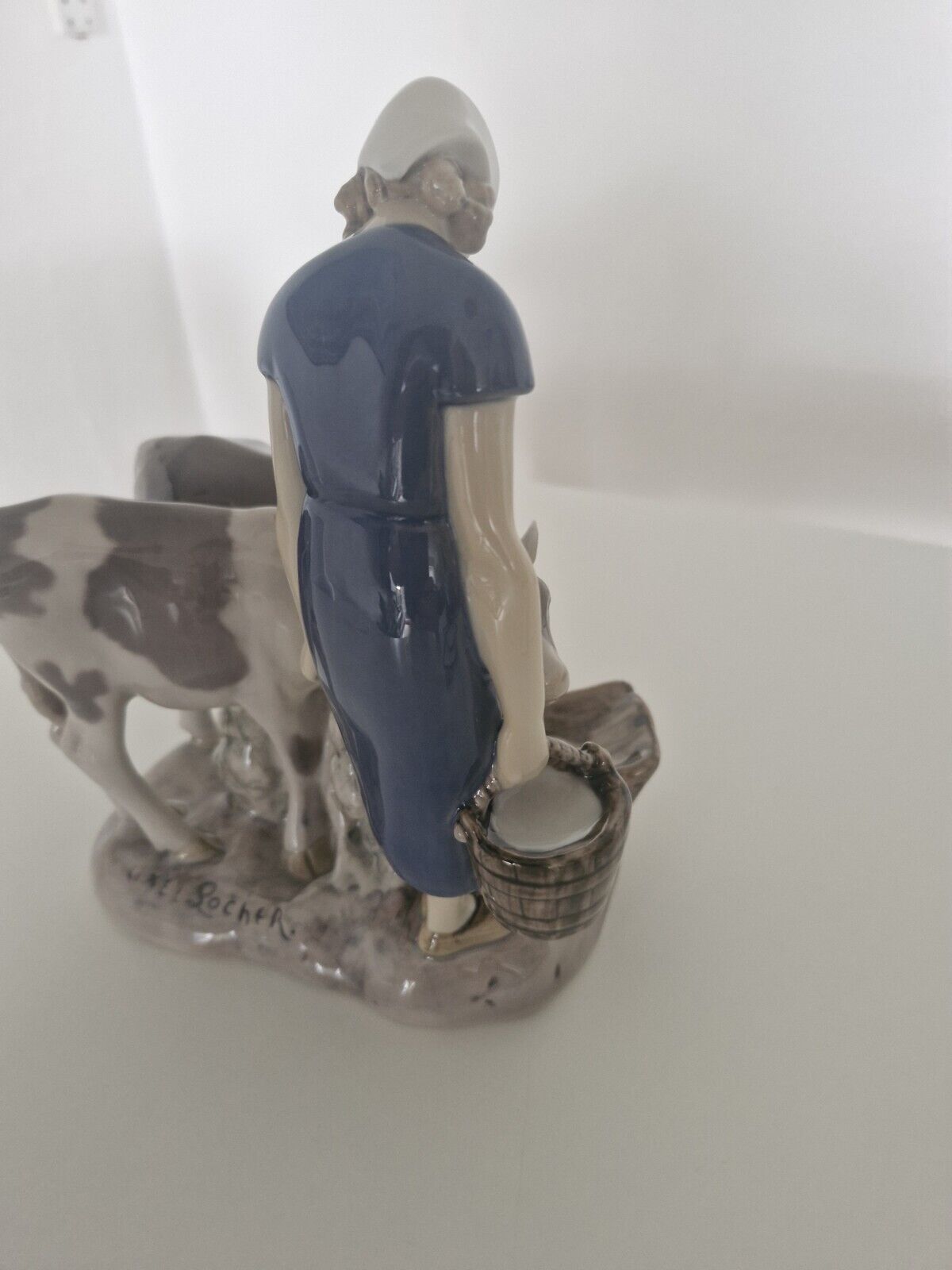 The Bing  Grondahl "Girl with Calves" figurine (no. 2270)