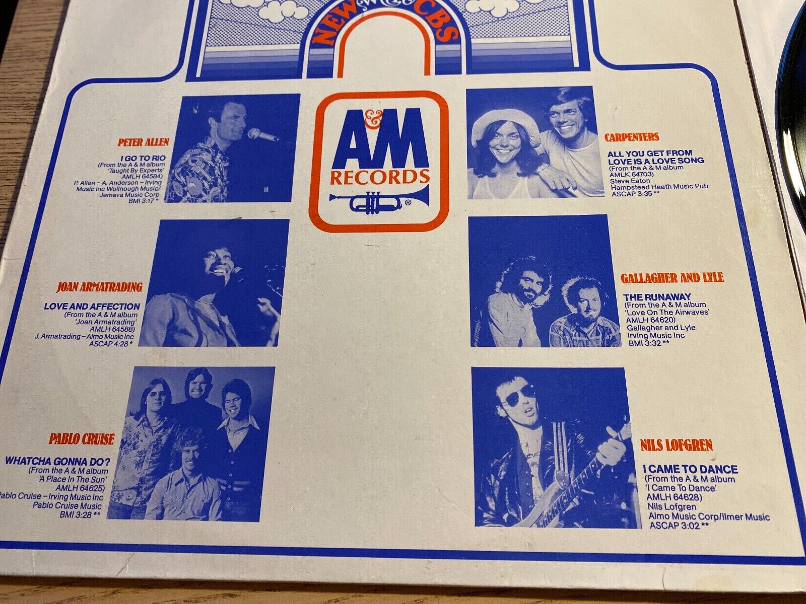 A  M SAMPLER PROMOTIONAL 1977 A  M RECORDS 12" 12 SONGS W GERMAN PRESS PROMO*