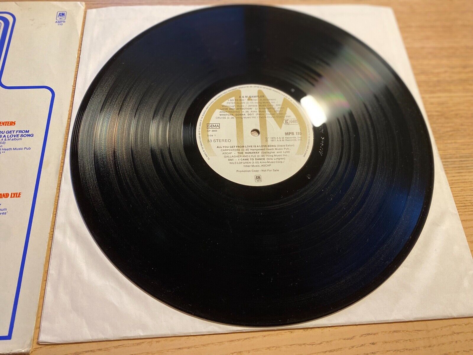 A  M SAMPLER PROMOTIONAL 1977 A  M RECORDS 12" 12 SONGS W GERMAN PRESS PROMO*