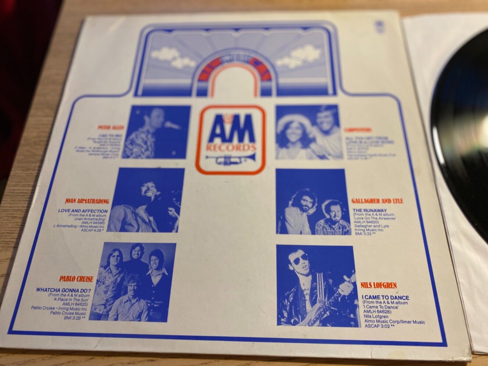 A  M SAMPLER PROMOTIONAL 1977 A  M RECORDS 12" 12 SONGS W GERMAN PRESS PROMO*