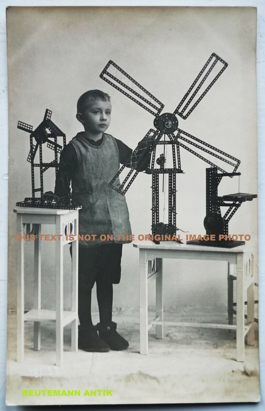 Mill photo postcard: Boy with his favorite toy The Meccano set c 1920  pok1058