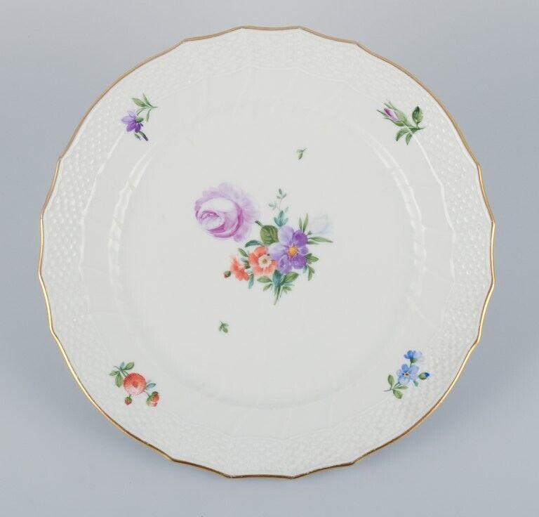 Royal Copenhagen four Saxon Flower dinner plates in porcelain