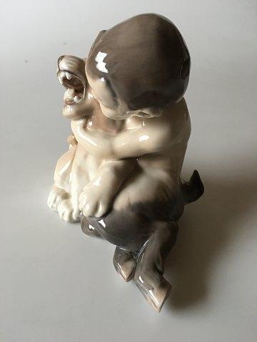 Royal Copenhagen Figurine Faun with lioncub No 2852