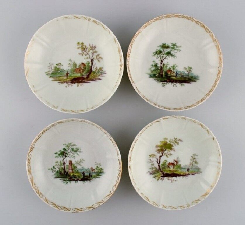 Four antique Royal Copenhagen porcelain bowls with hand-painted landscapes