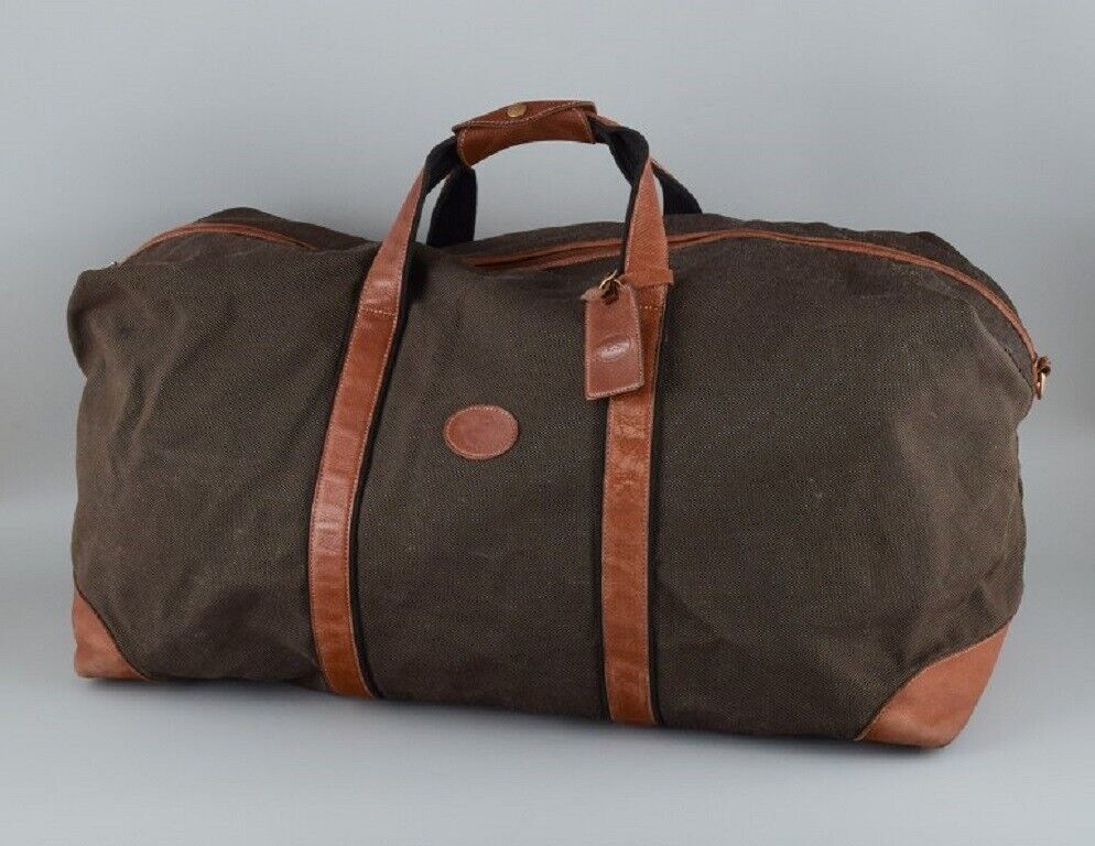 Longchamp large travel bag in canvas and grain leather Late 1900s