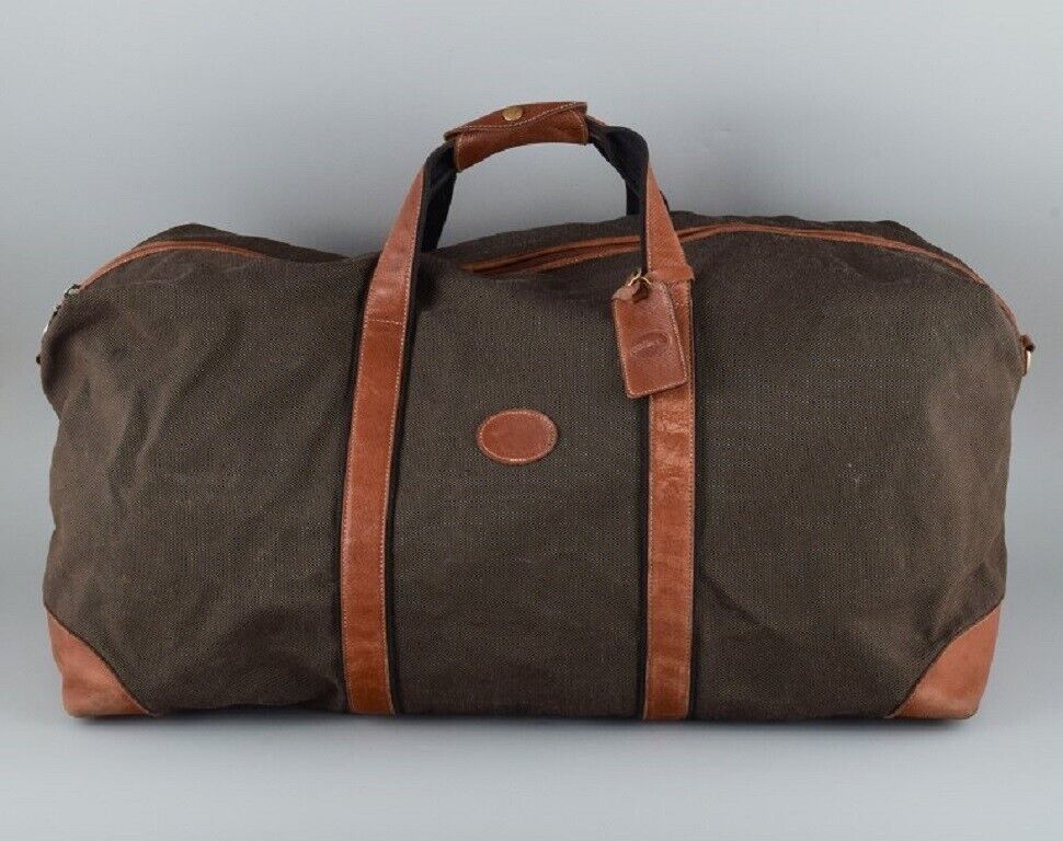 Longchamp large travel bag in canvas and grain leather Late 1900s