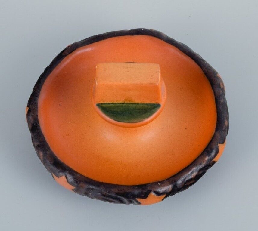 Ipsen's Denmark Two small bowls with glaze in orange-green shades