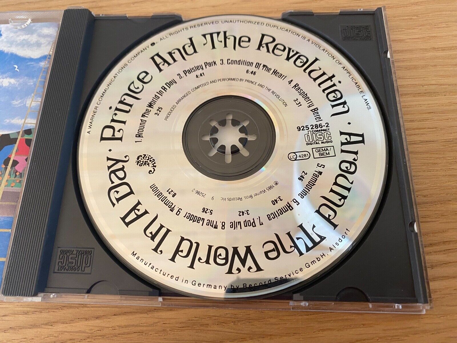 PRINCE  THE REVOLUTION "AROUND THE WORLD IN A DAY" CD ALBUM 9 TRACK WARNER BROS