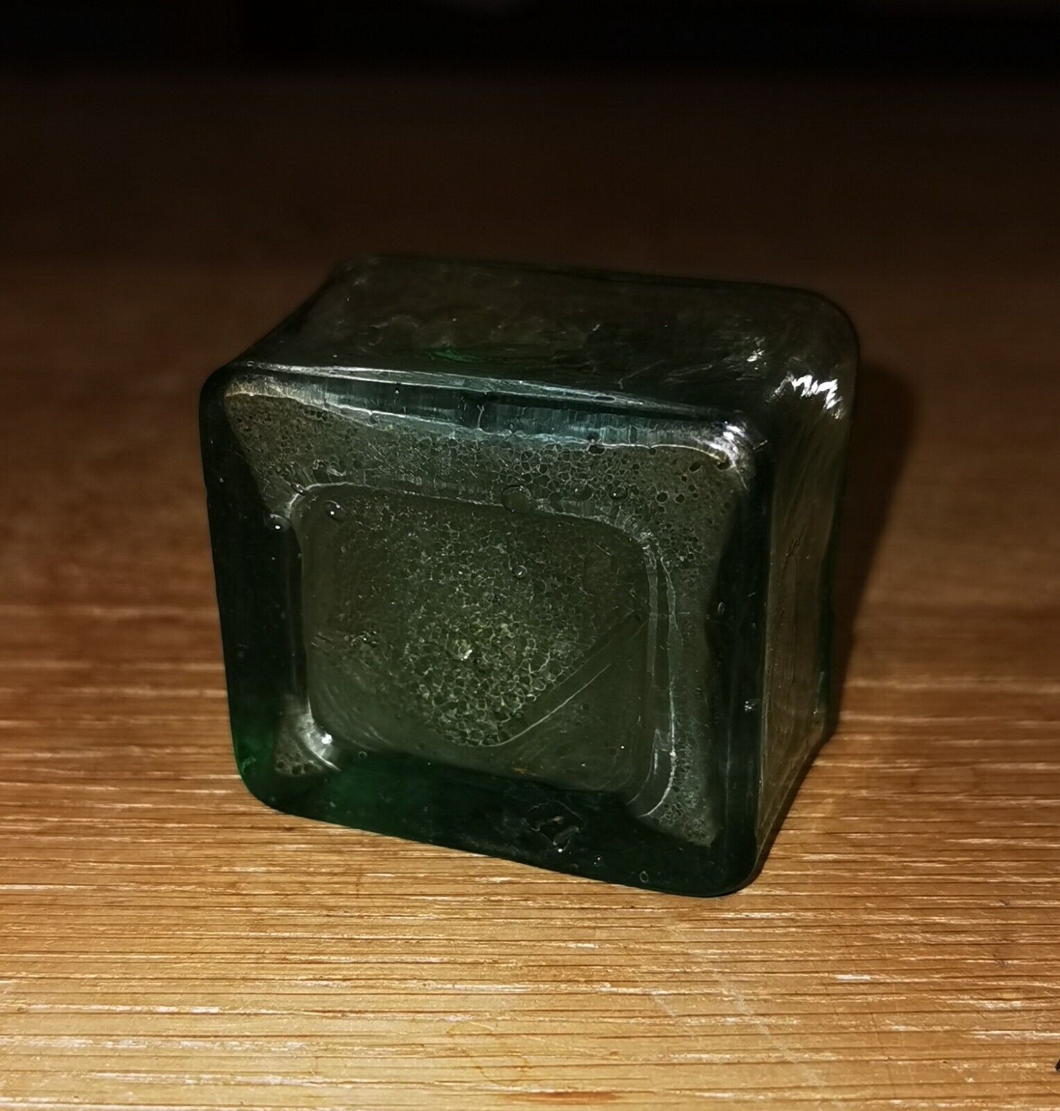 Antique green transparent ink well in glass from the late 19th century