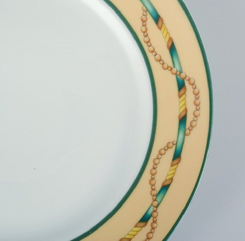 Giacomo Passera for Porcelaine de Paris A set of four plates