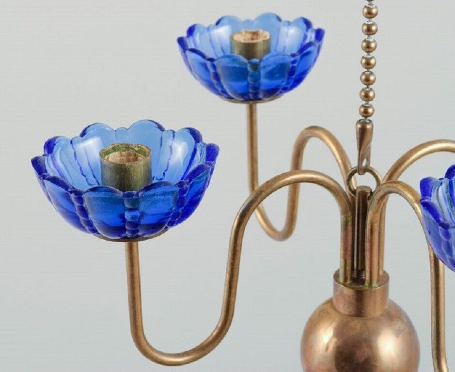 Gunnar Ander for Ystad Metall Chandelier for 4 candles in brass and art glass