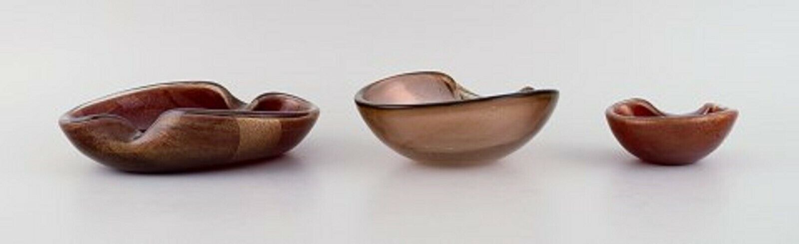 Three organically shaped Murano bowls in mouth blown art glass Italian design