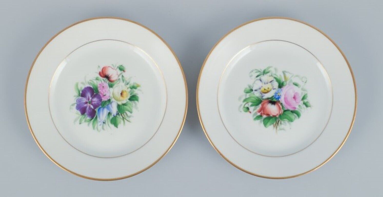 Bing  Grondahl set of fourteen plates in porcelain with flowers