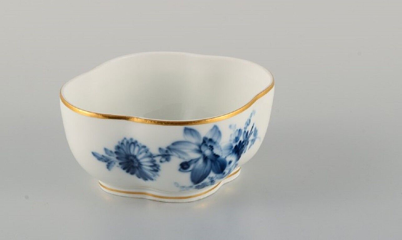 Meissen two bowls hand-painted with blue flowers and gold rim Late 19th C