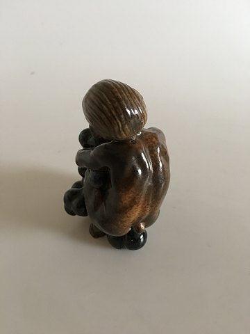 Bing and Grondahl Stoneware figurine Boy with grapes by Kai Nielsen