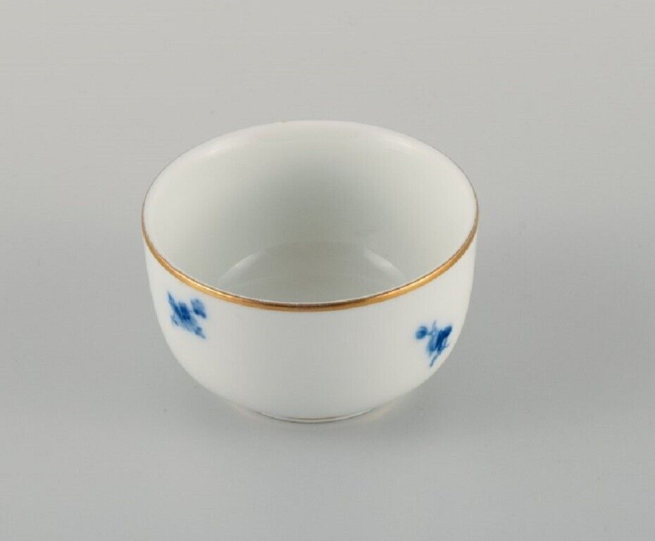 Meissen two bowls hand-painted with blue flowers and gold rim Late 19th C