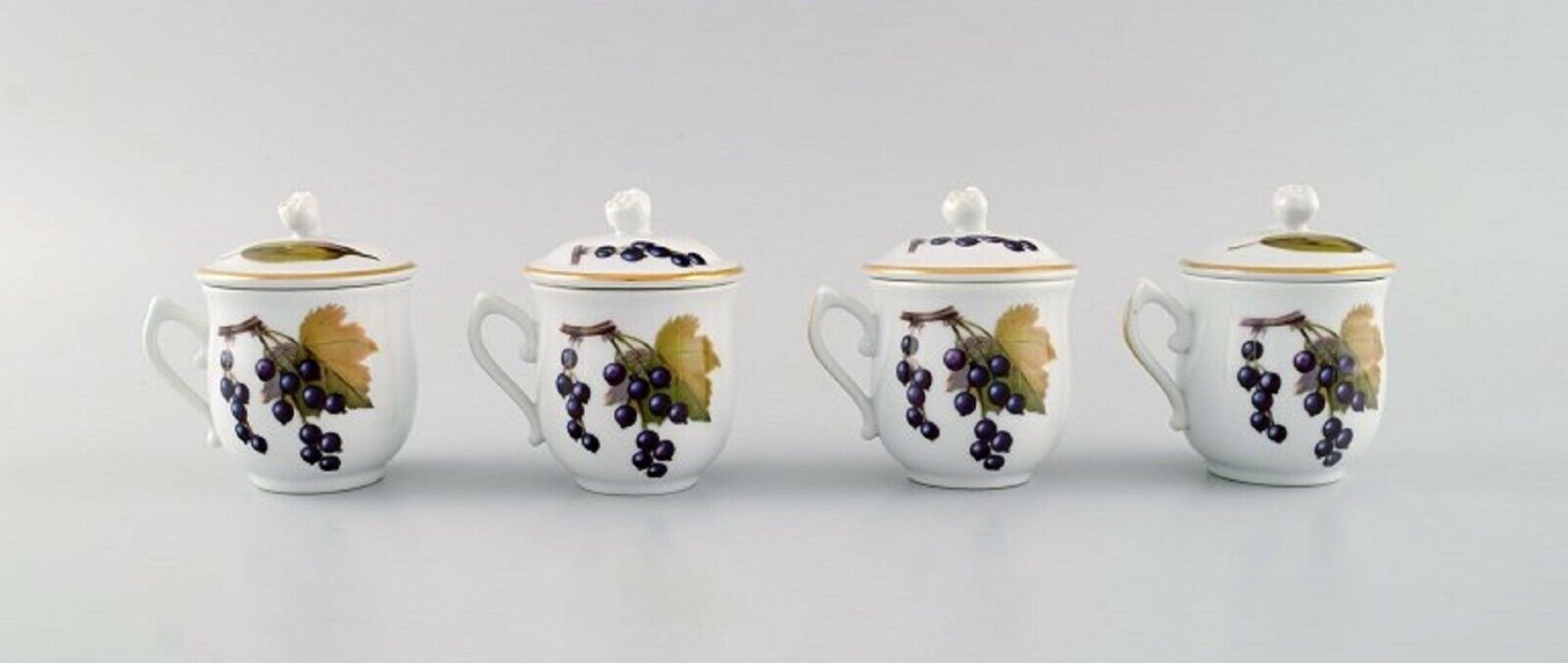 Royal Worcester England Four Evesham porcelain cream cups with fruits