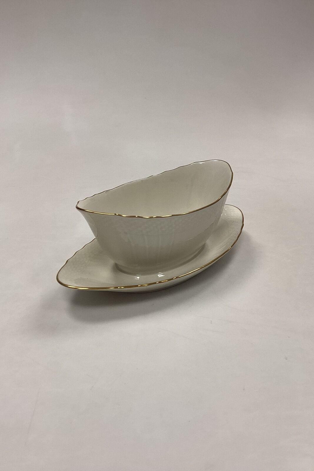 Royal Copenhagen Creme Curved with Gold (Stel 1235) Saucer No 1651