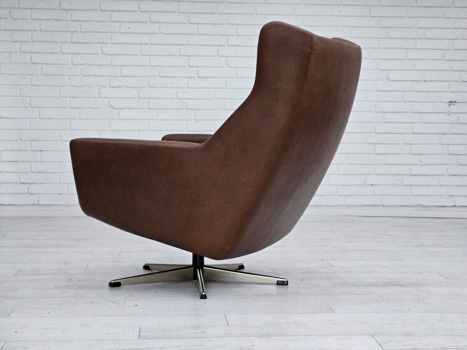 1970s Danish swivel chair with footstool original good condition leather