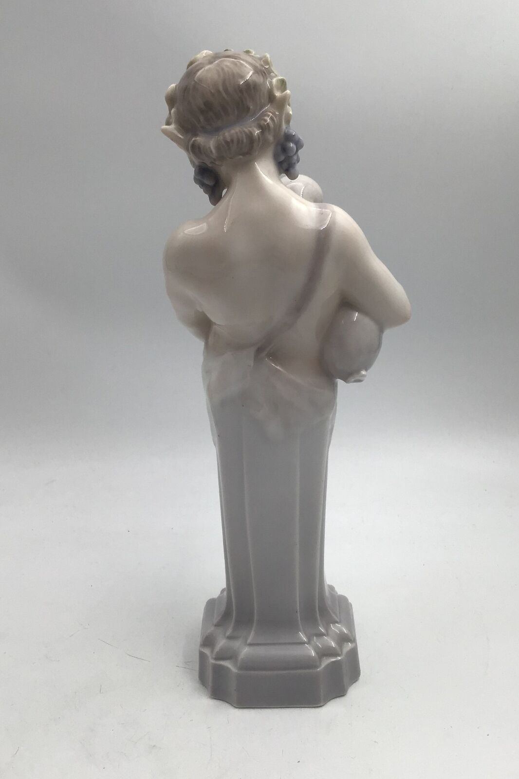 Royal Copenhagen Figurine Dionysus / Bacchus with bagpipe No 2071