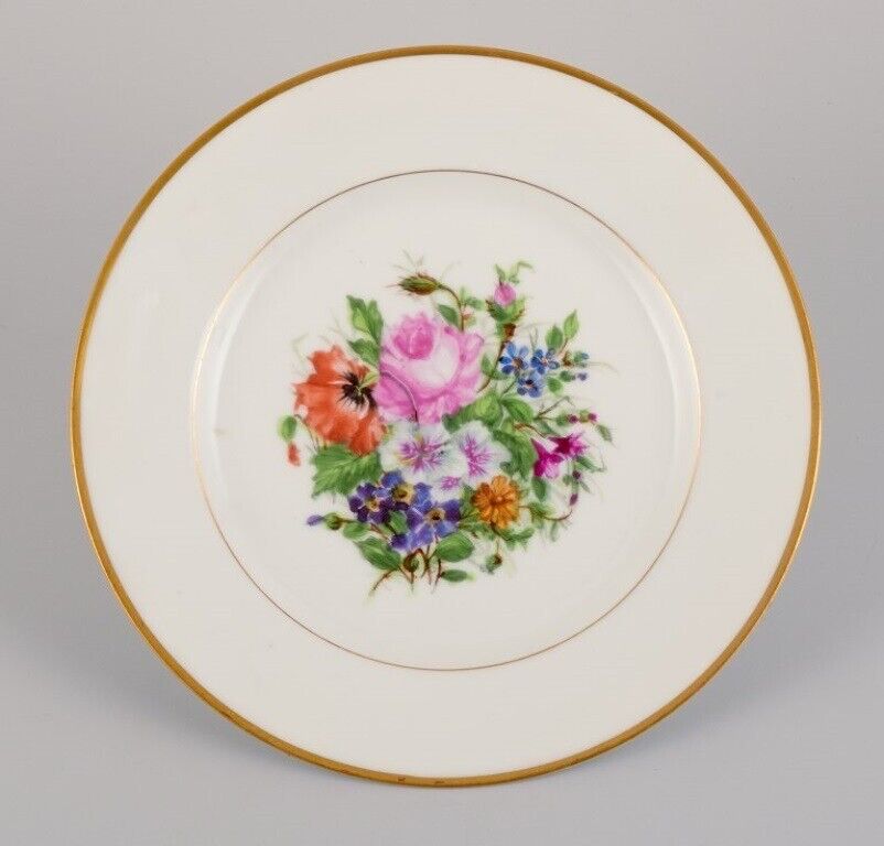 Bing  Grøndahl seven porcelain lunch plates with flowers and gold decoration