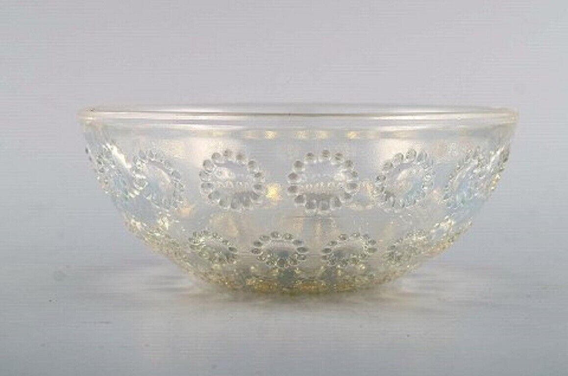 Three early René Lalique "Asters" bowls in art glass Dated before 1945