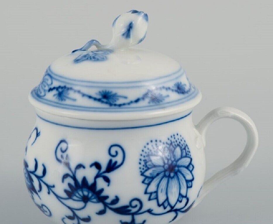 Meissen three Blue Onion cream cups Approx 1900