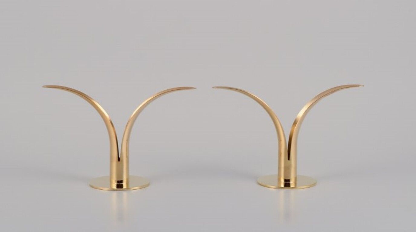 Ivar Ålenius Björk Two Liljan candle holders in brass Skultuna Sweden