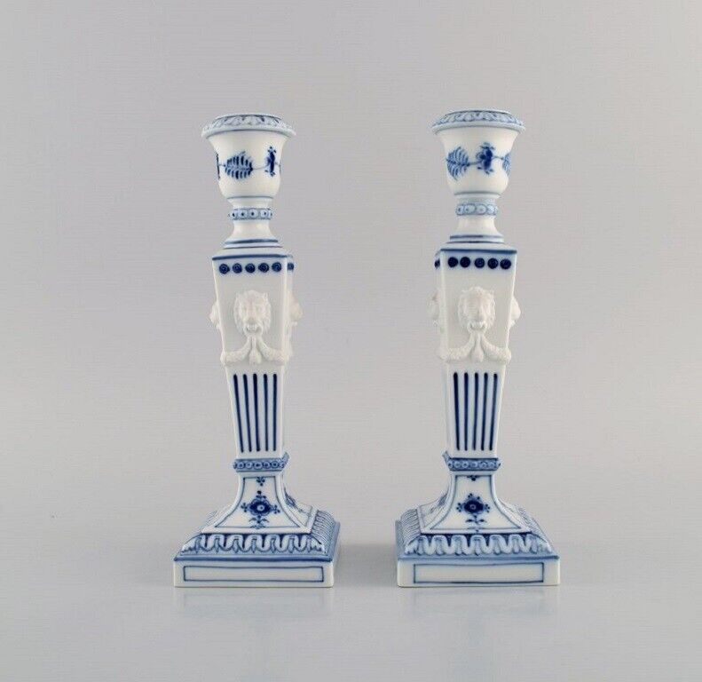 Two Royal Copenhagen Blue Fluted Plain candlesticks with lion heads