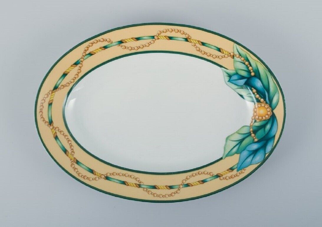 Giacomo Passera for Porcelaine de Paris A large oblong dish and a round dish