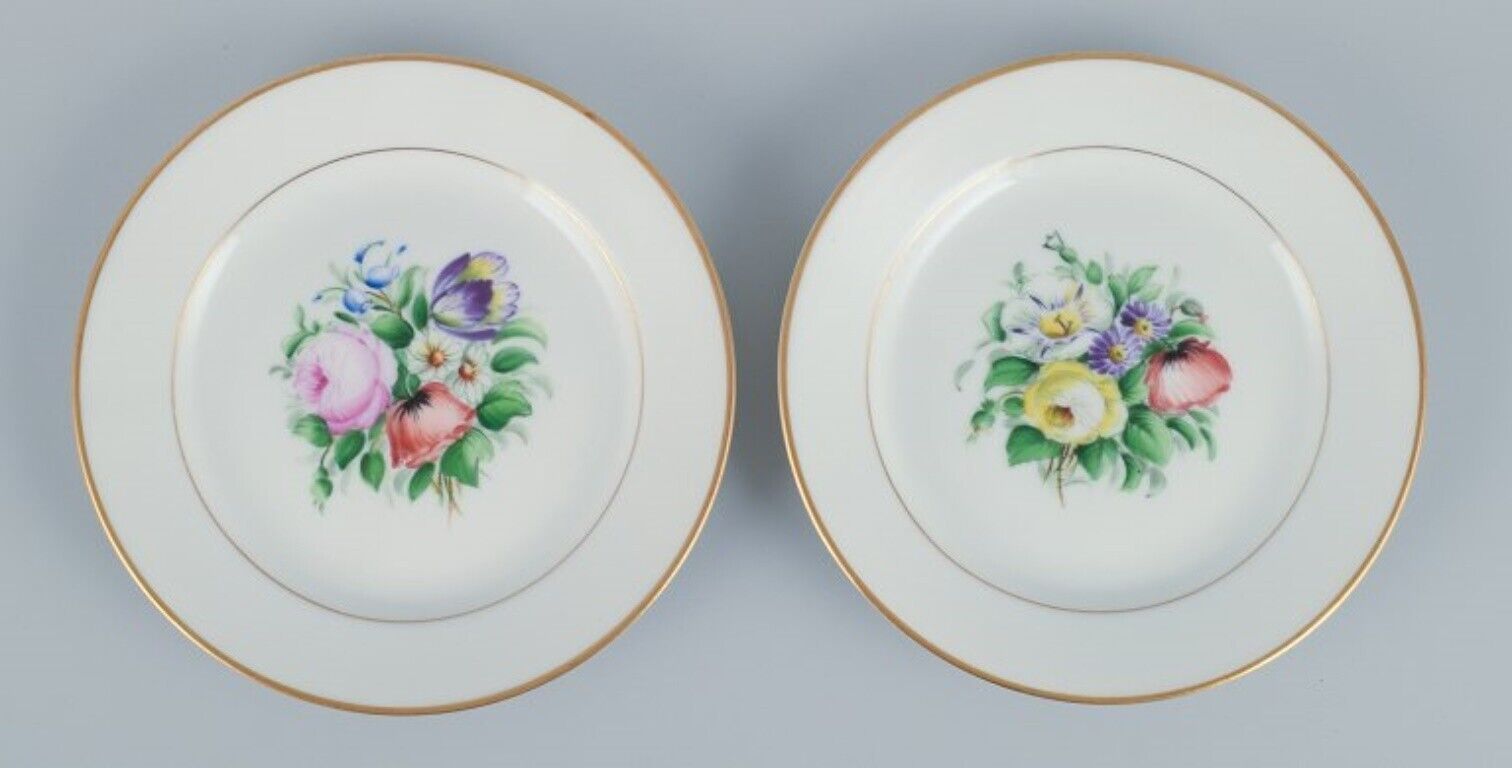 Bing  Grondahl set of fourteen plates in porcelain with flowers