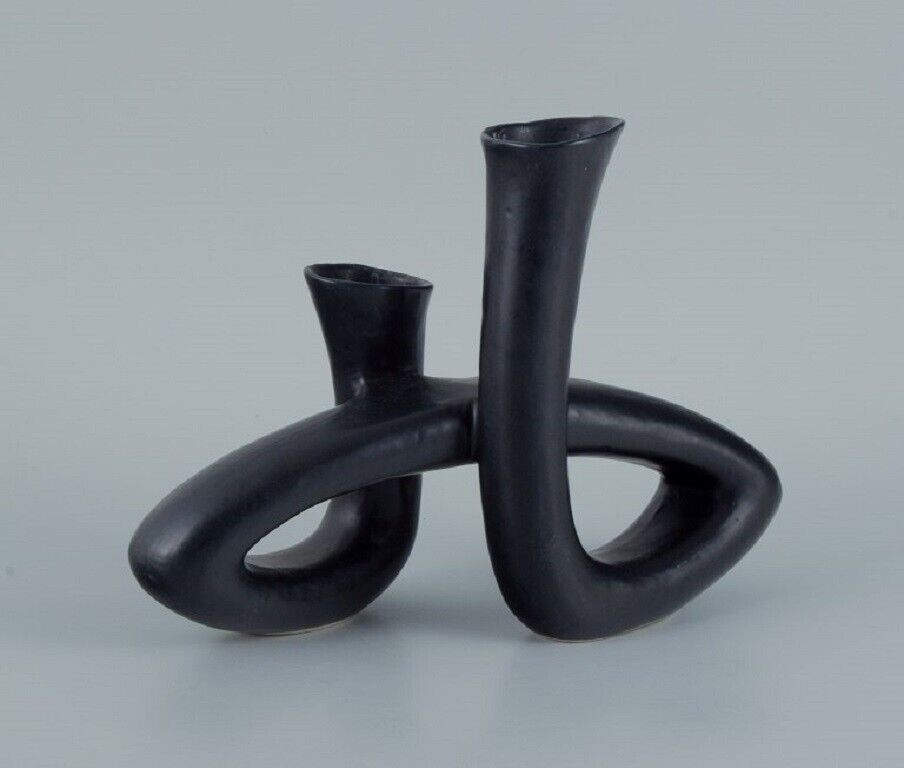 European studio ceramicist Unique twisted vase in black glaze