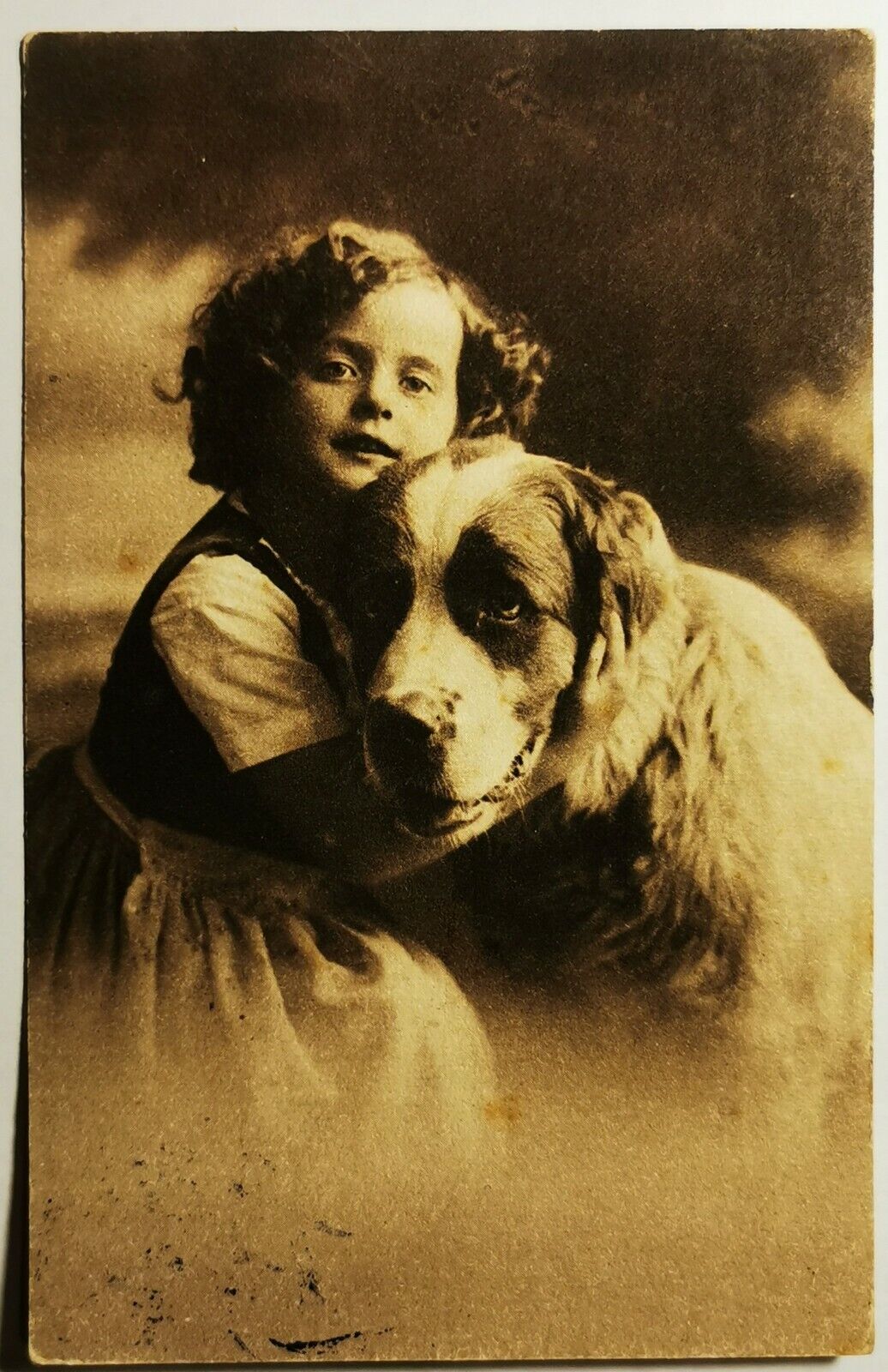 Old photo postcard: Portrait young girl and her big dog Mailed in 1911  pok1454