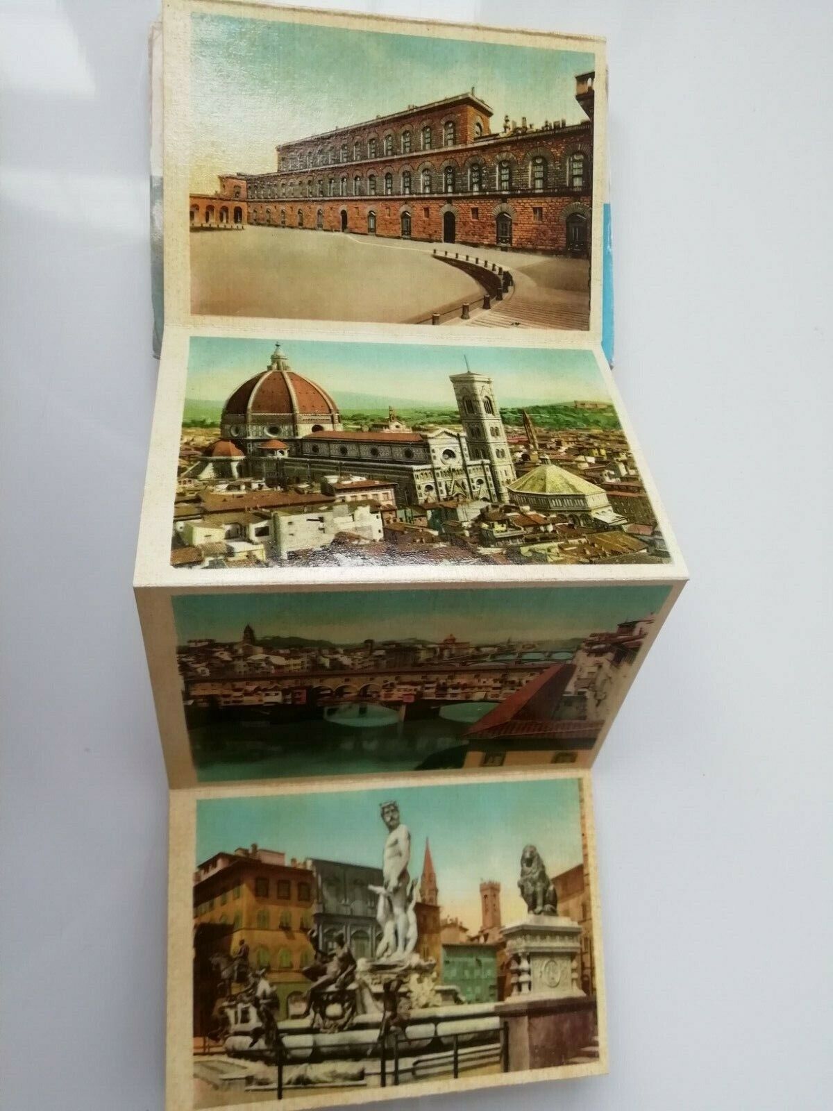 Vintage folder with hand-colored old photos of FirenzeItaly 