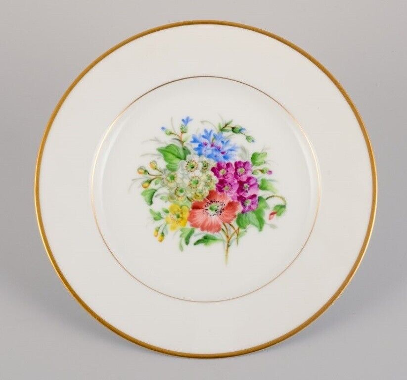 Bing  Grøndahl seven porcelain lunch plates with flowers and gold decoration