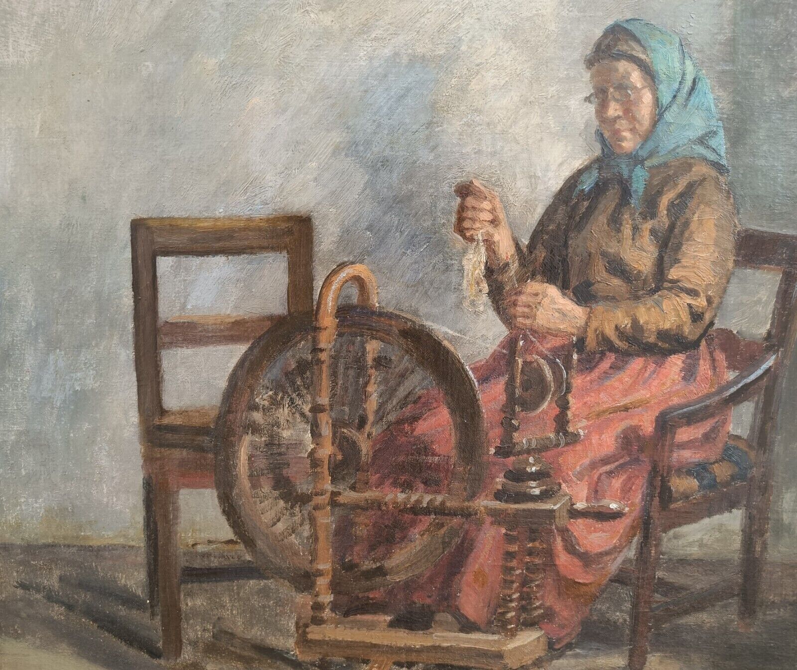 Johannes Wilhjelm (1868-1938): AT THE SPEENING WHEEL dated 1918