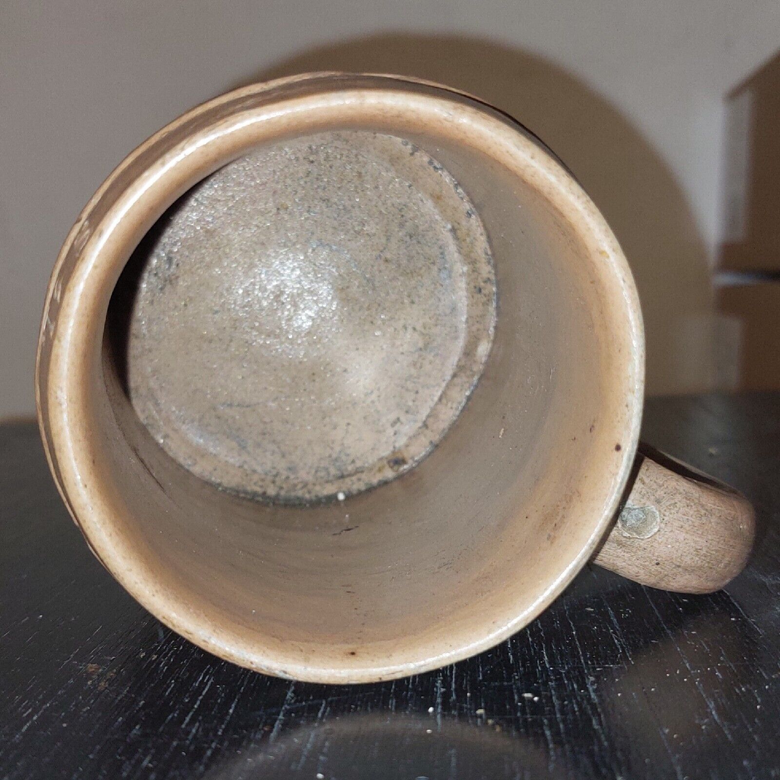 Antique stoneware mug from Germany c 1860 with relief decoration