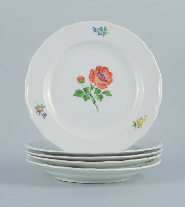 Meissen Germany Five porcelain dinner plates decorated with flowers