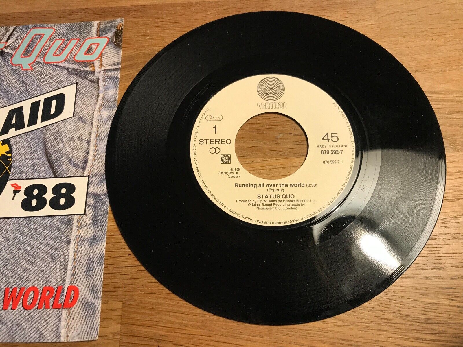 STATUS QUO "RUNNING ALL OVER THE WORLD" 1988 VERTIGO RECORDS SPORT AID ´88