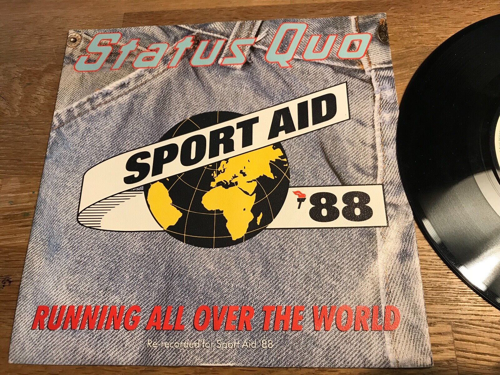 STATUS QUO "RUNNING ALL OVER THE WORLD" 1988 VERTIGO RECORDS SPORT AID ´88