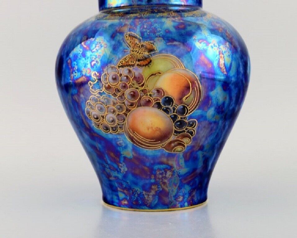 Large Rosenthal lidded jar in blue glazed porcelain with hand-painted fruits