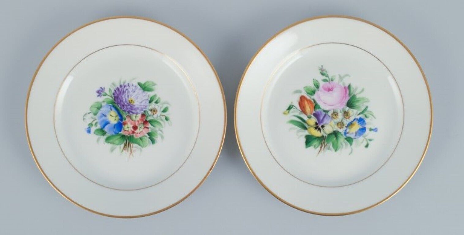 Bing  Grondahl set of fourteen plates in porcelain with flowers