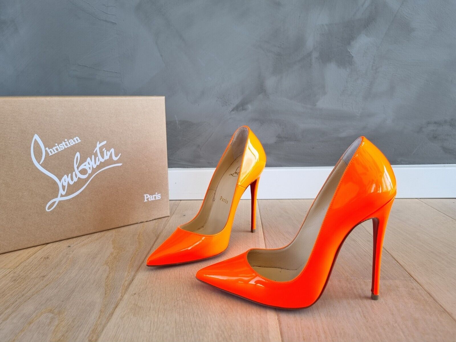 **Christian Louboutin** Orange Patent Leather So Kate Pumps Heels Sz 36